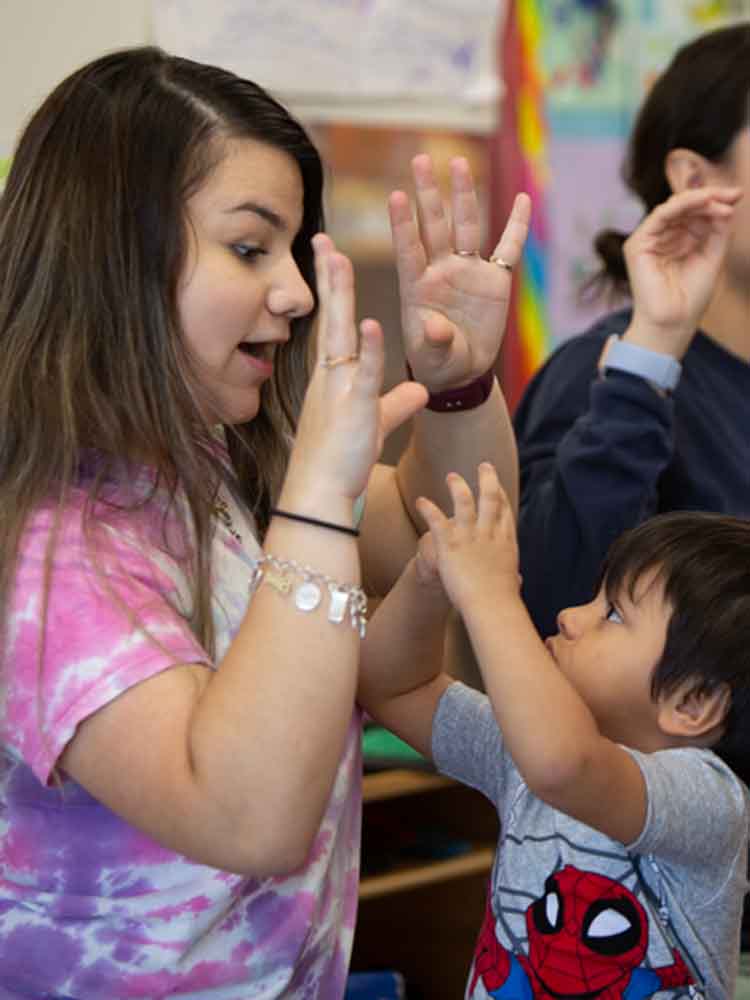 teacher playing with student