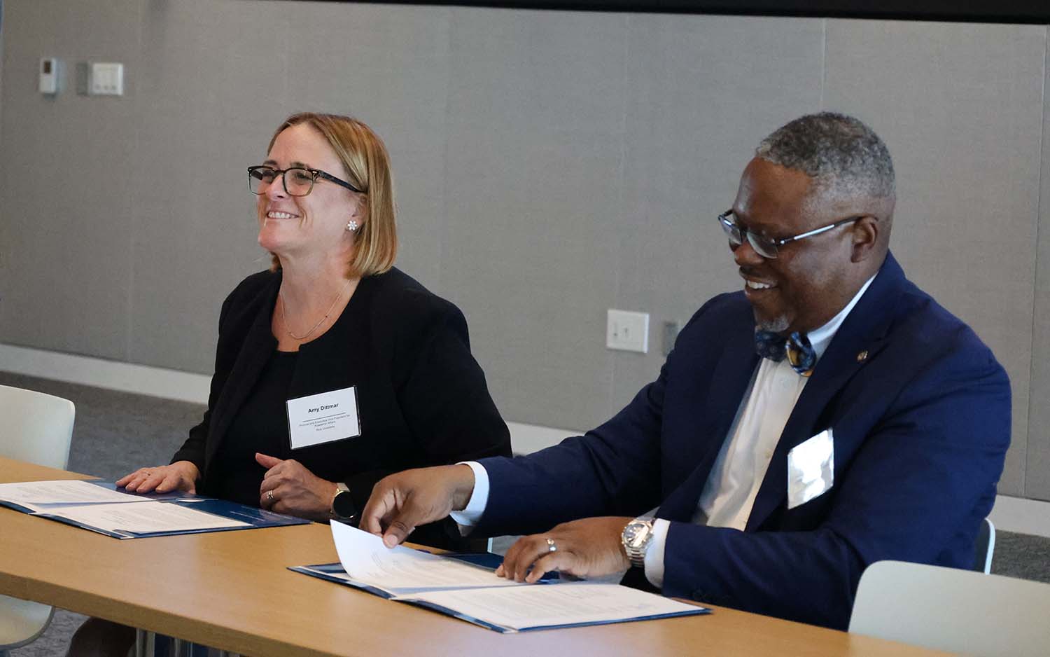 Amy Dittmar, Howard R. Hughes provost and executive vice president for academic affairs at Rice University and Dr. Alexander Okwonna, North Campus provost and incoming deputy chancellor and college president at San Jacinto college sign the Take Flight Scholars memorandum of understanding. 
